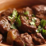 Traditional Moroccan Beef Tagine with apricots and almonds